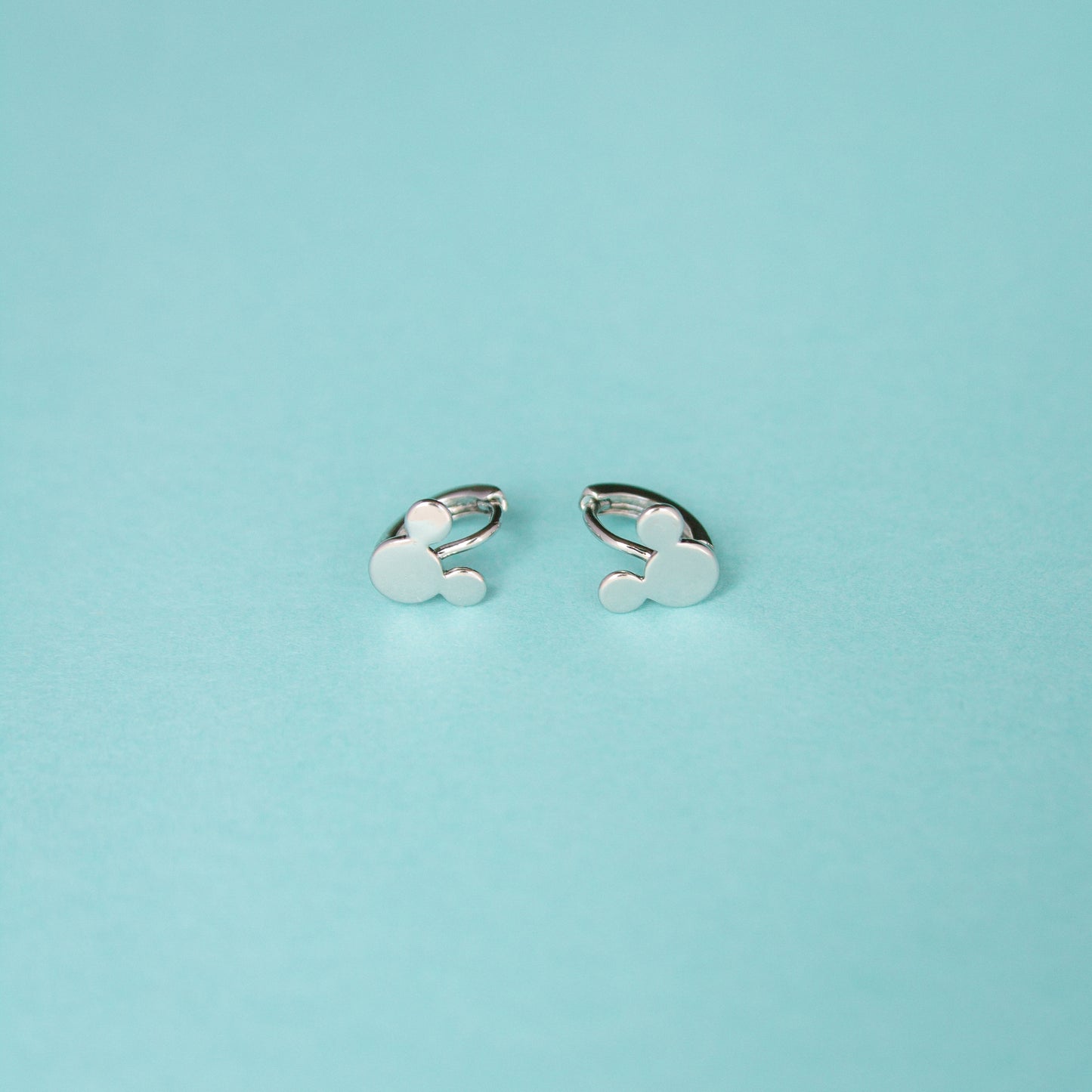 Happiest Earrings On Earth Mini Huggies - Silver