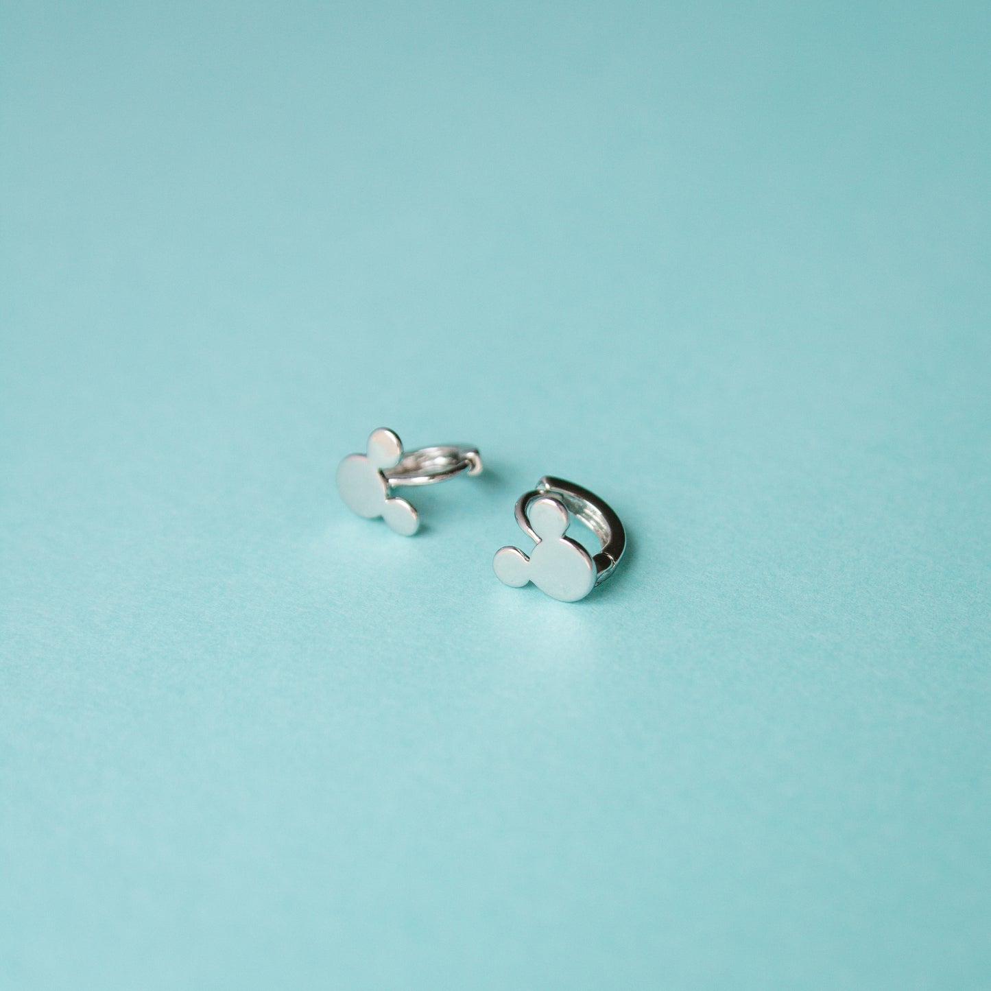 Happiest Earrings On Earth Mini Huggies - Silver