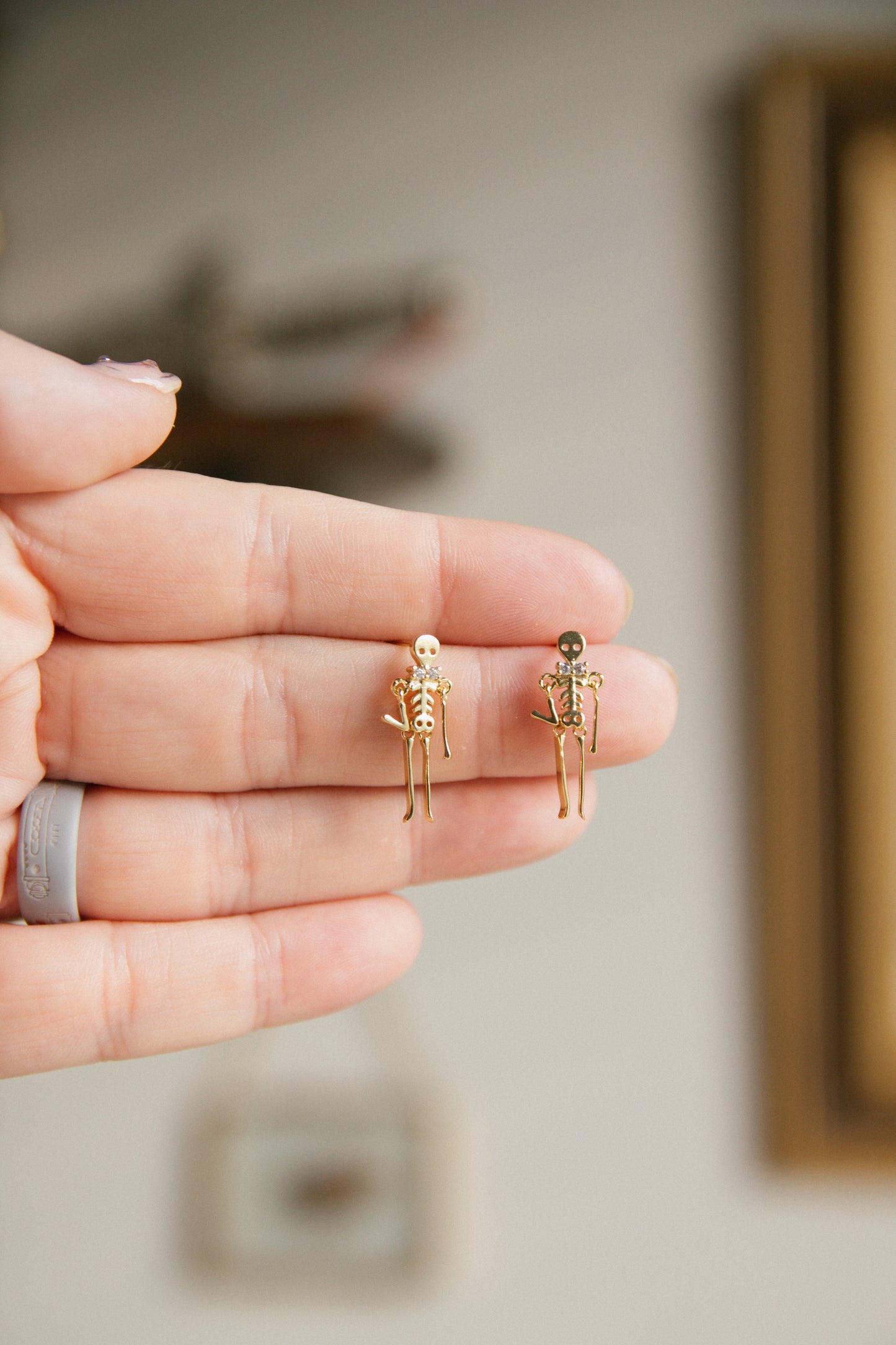 Drop Dead Skeleton Earrings - Gold