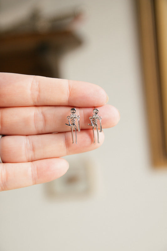 Drop Dead Skeleton Earrings - Silver
