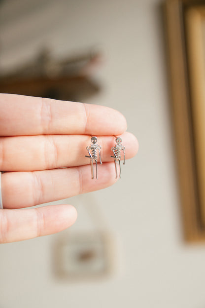Drop Dead Skeleton Earrings - Silver